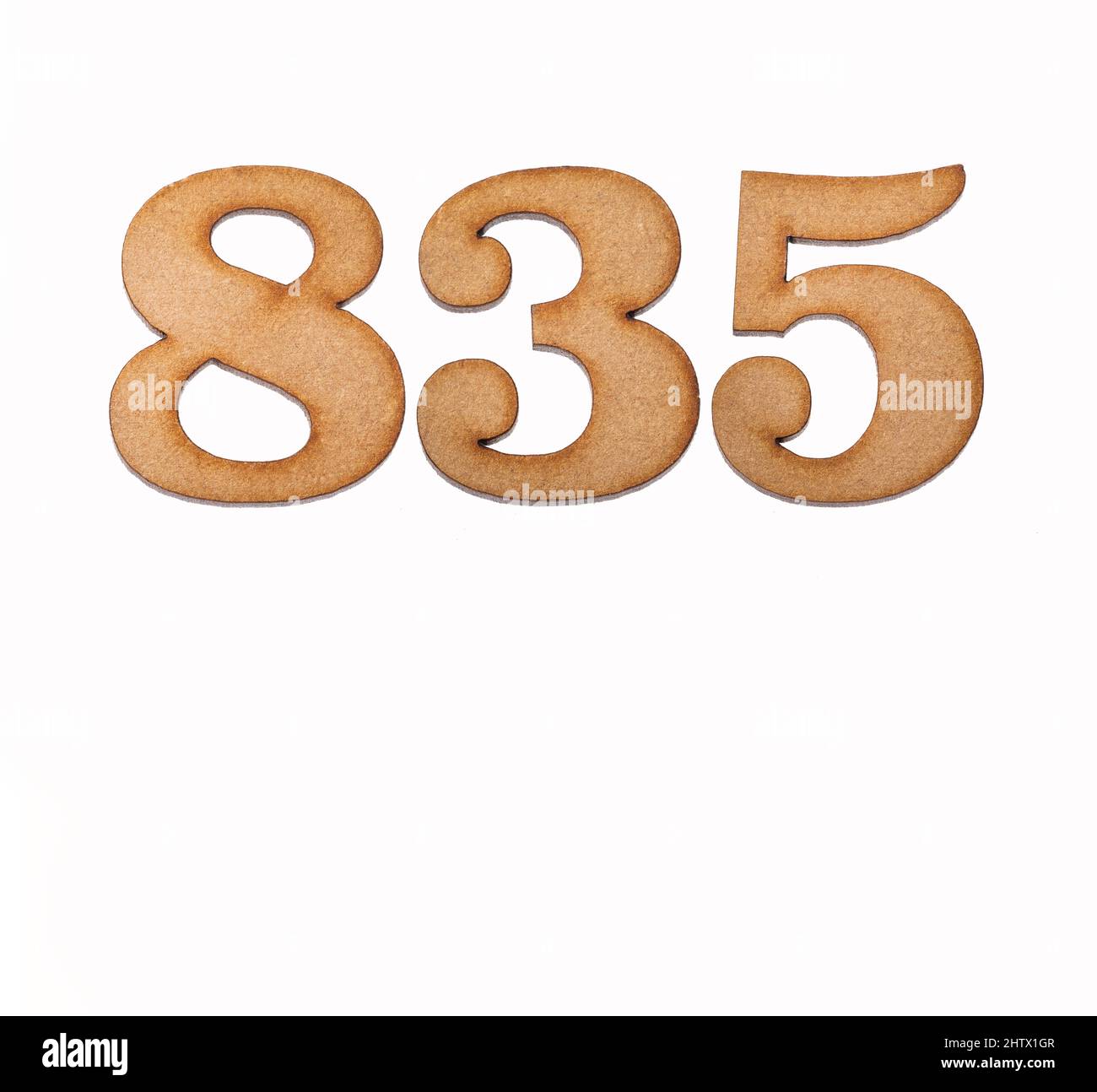 Number 835 in wood, isolated on white background Stock Photo - Alamy