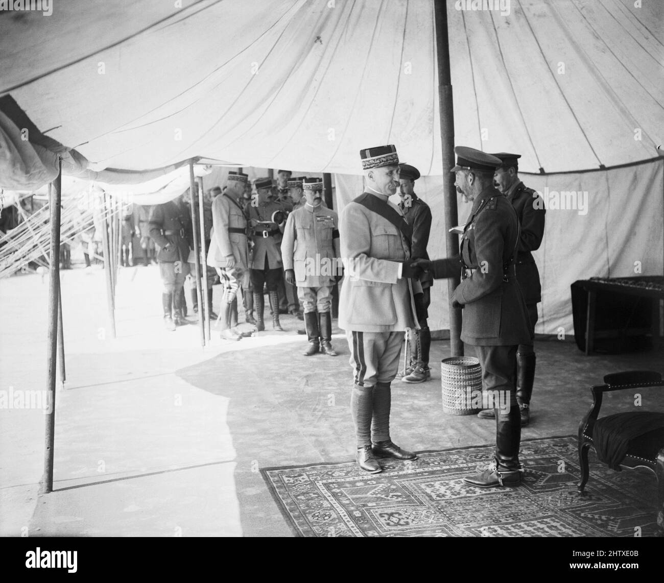 King George V decorates General Philippe Pétain with the Order of the Bath at Albert, France, on 12 July 1917. Stock Photo