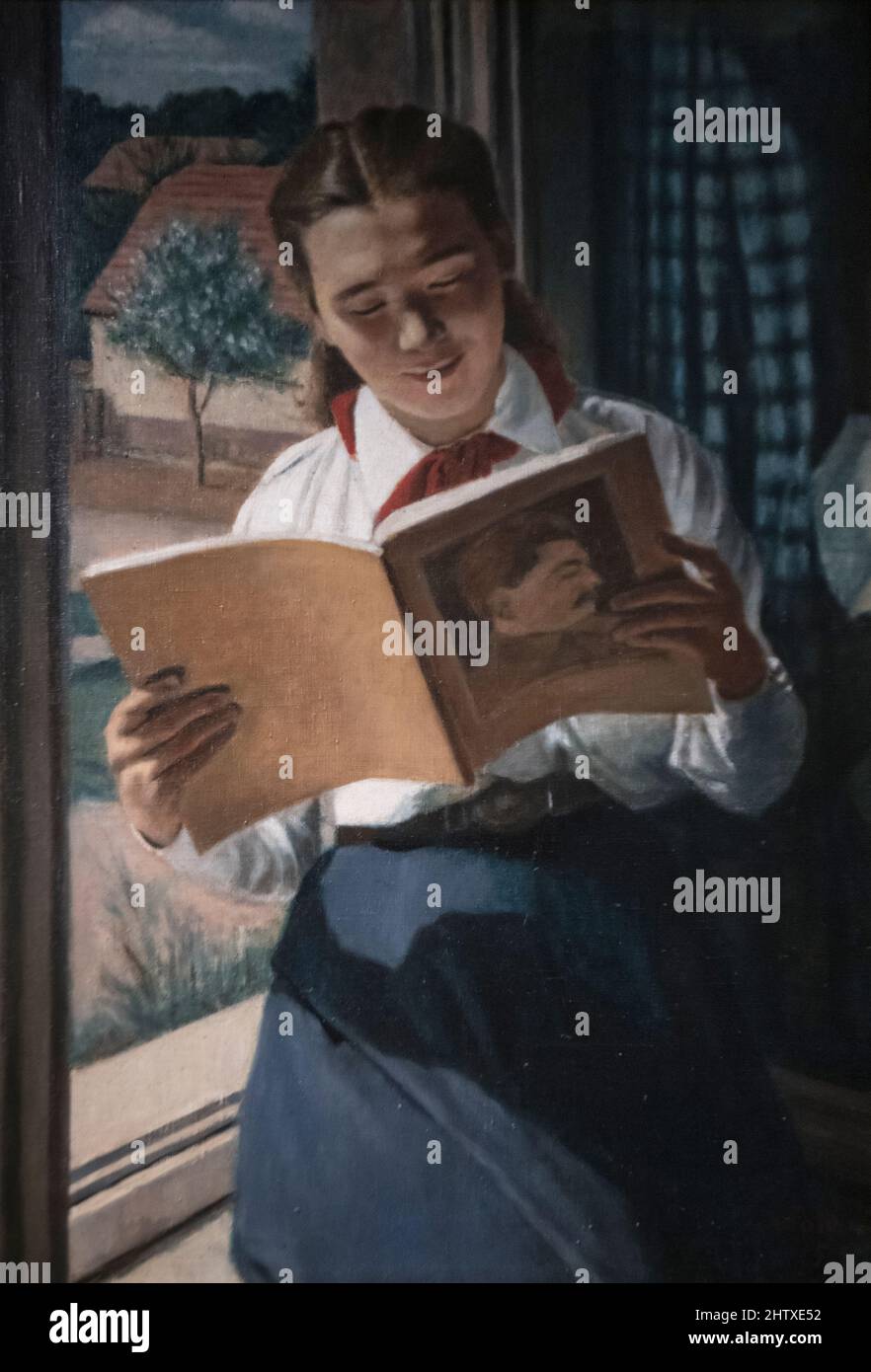 Zoltan Szalai: 'Pioneer girl reading' (1953) Stock Photo