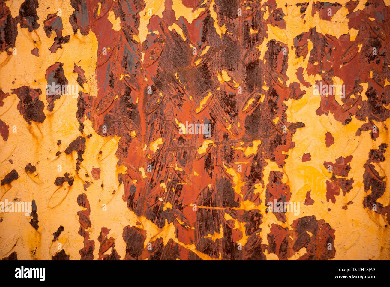 Orange grunge metal background with scratches and rust on steel painted ...