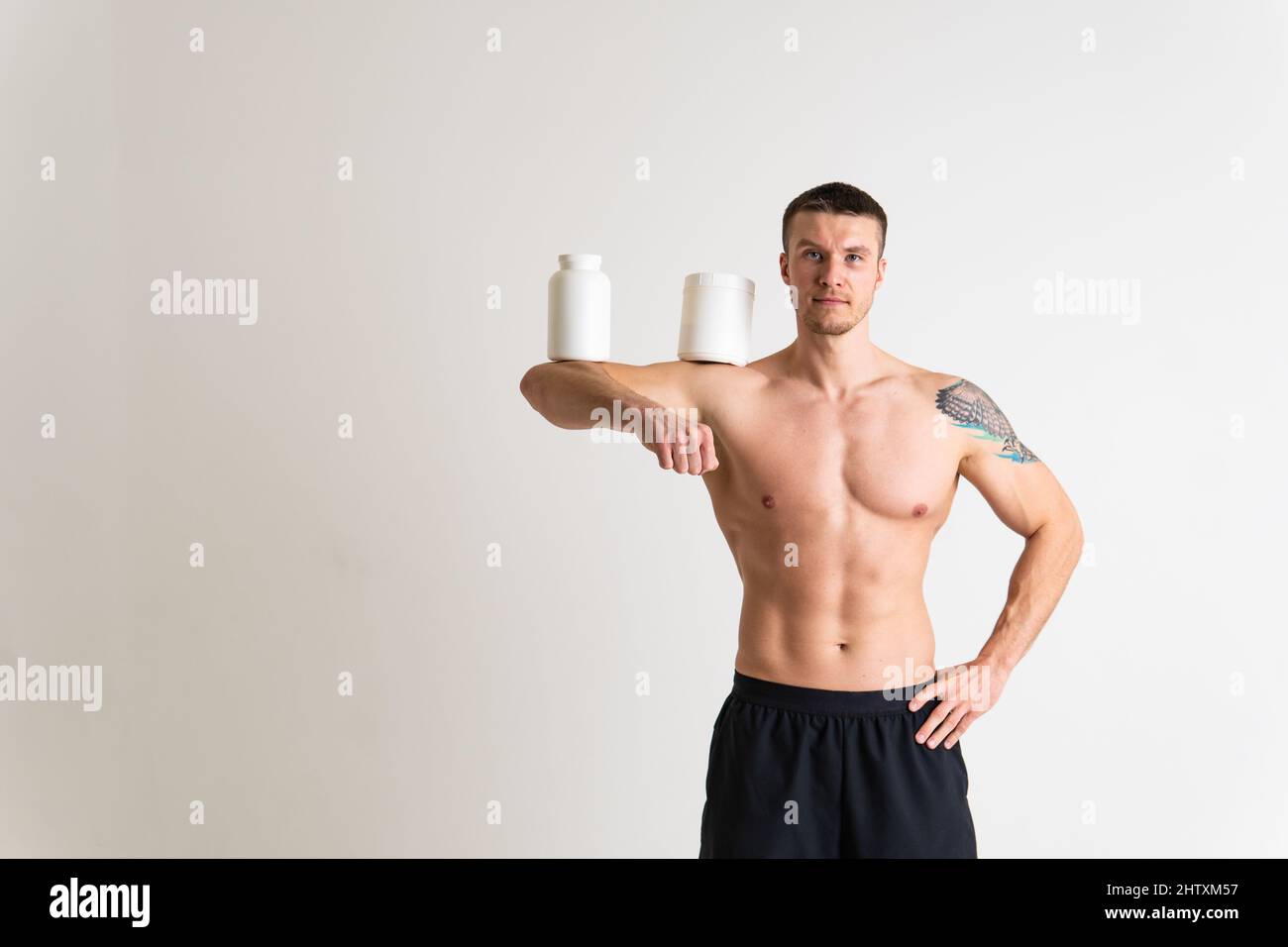 Fitness protein jars white on white background bodybuilder powder ...