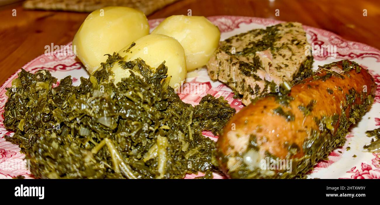 Plate of kale with potatoes, met sausages and bacon, North German speciality Stock Photo