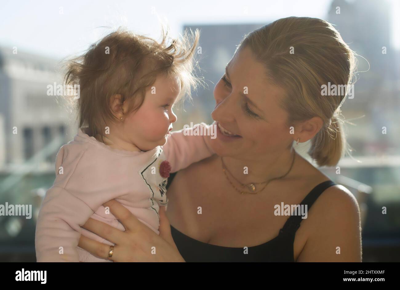 Mother with girl, toddler, 6 months, Stuttgart, Baden-Wuerttemberg, Germany Stock Photo