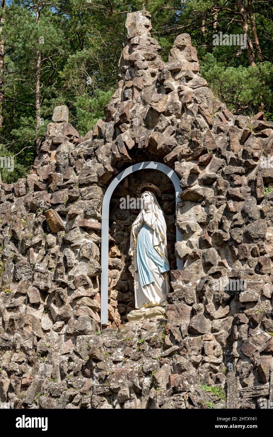 Statue of the Virgin Mary at the Grotto of the Virgin Mary, replica of the Grotto of Lourdes, place of pilgrimage, Bad Salzschlirf, Vogelsberg and Stock Photo