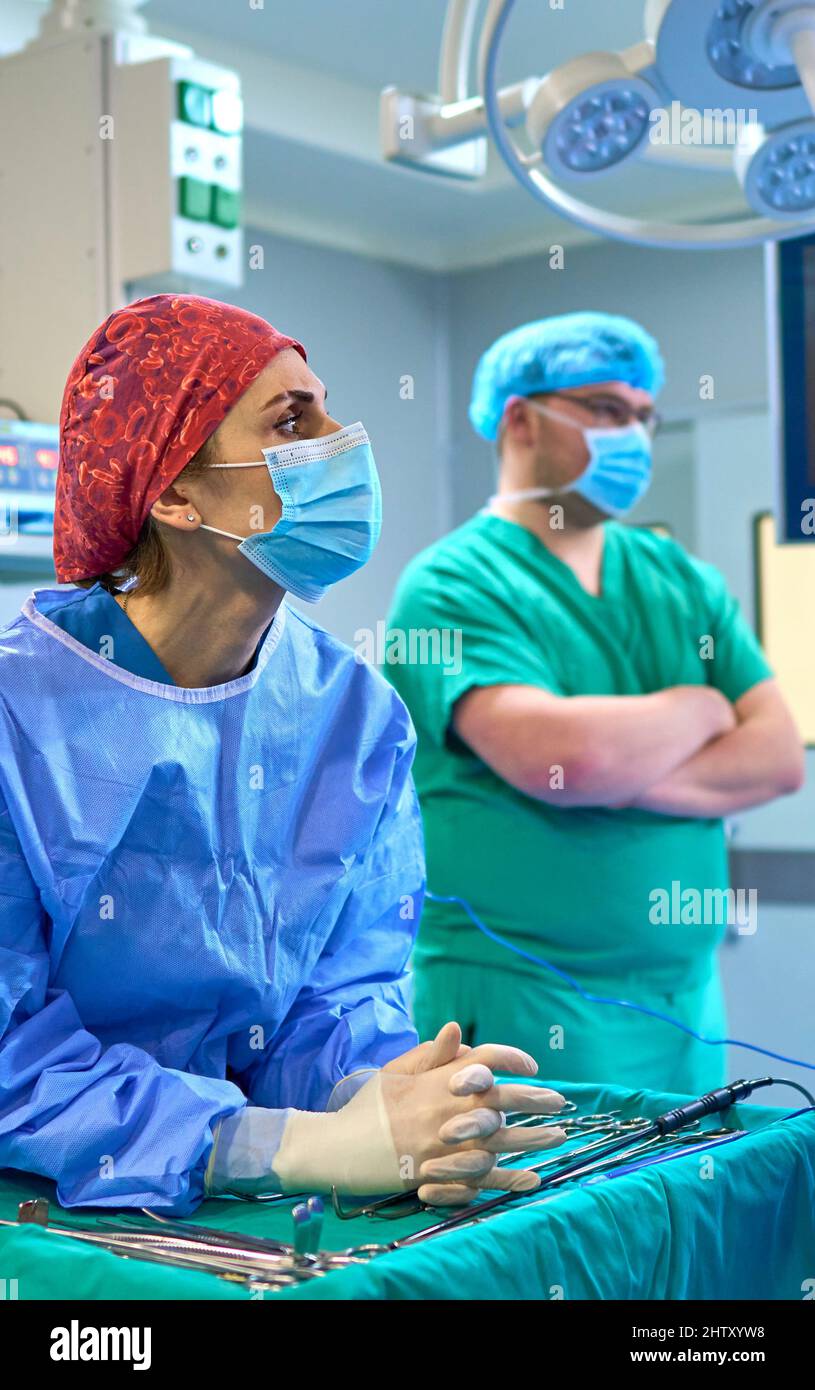 doctors in the operating room perform surgery on a patient Stock Photo ...