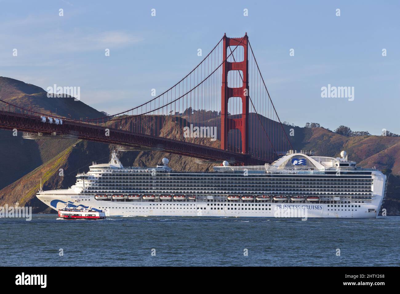 Princess Cruises Large Cruise Line Ship Sailing Out Under Famous Golden Gate Landmark Bridge. Scenic San Francisco California Bay Coast Landscape Stock Photo
