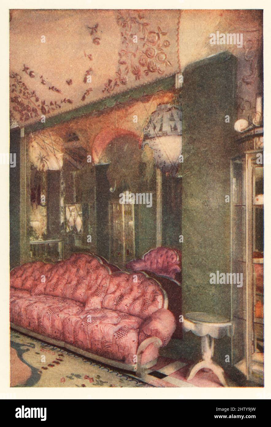 Art Deco interior of the Richard Hudnut shop, rue de la Paix, Paris, 1928. A large pink sofa under a mirror, glass chandelier, and pink ceiling. Smithsonian-process colour print from Richard le Gallienne’s Romance of Perfume, Hudnut, New York, 1928. Stock Photo