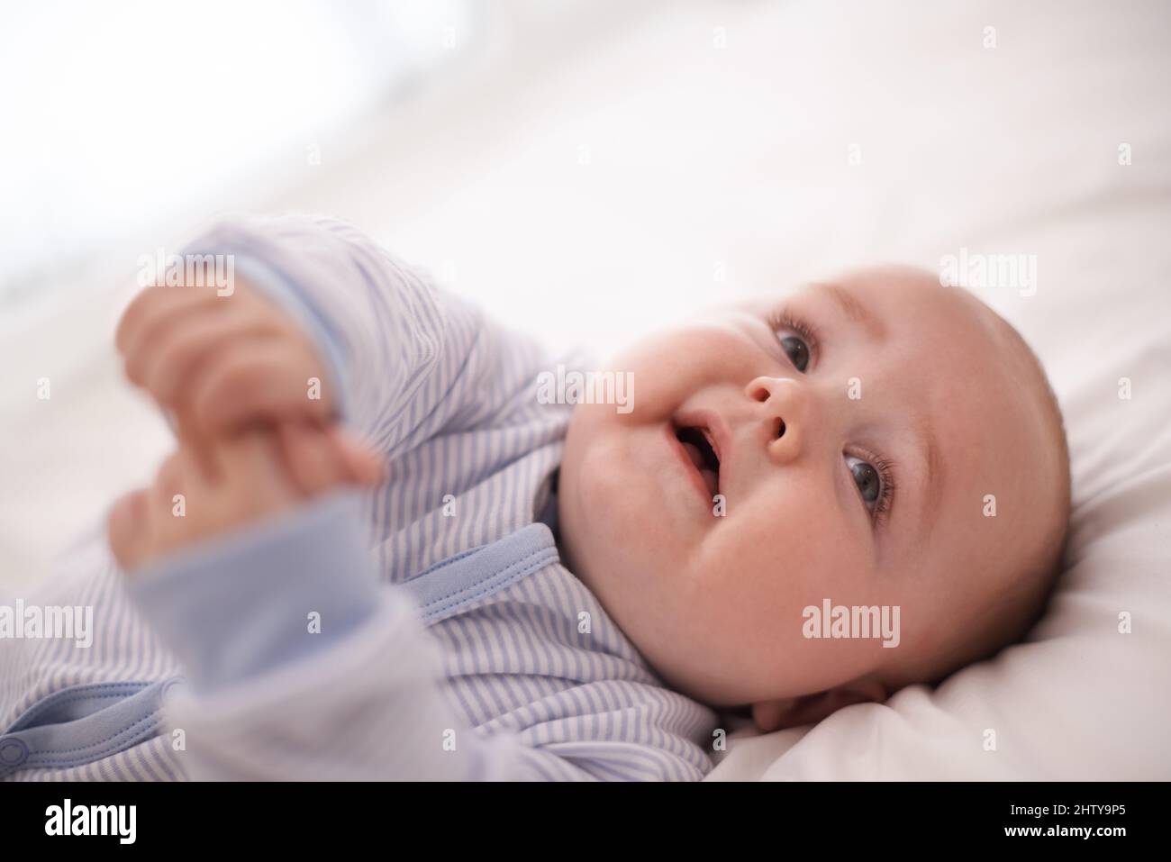 Im not quite tired yet. Cropped shot of an adorable baby boy. Stock Photo