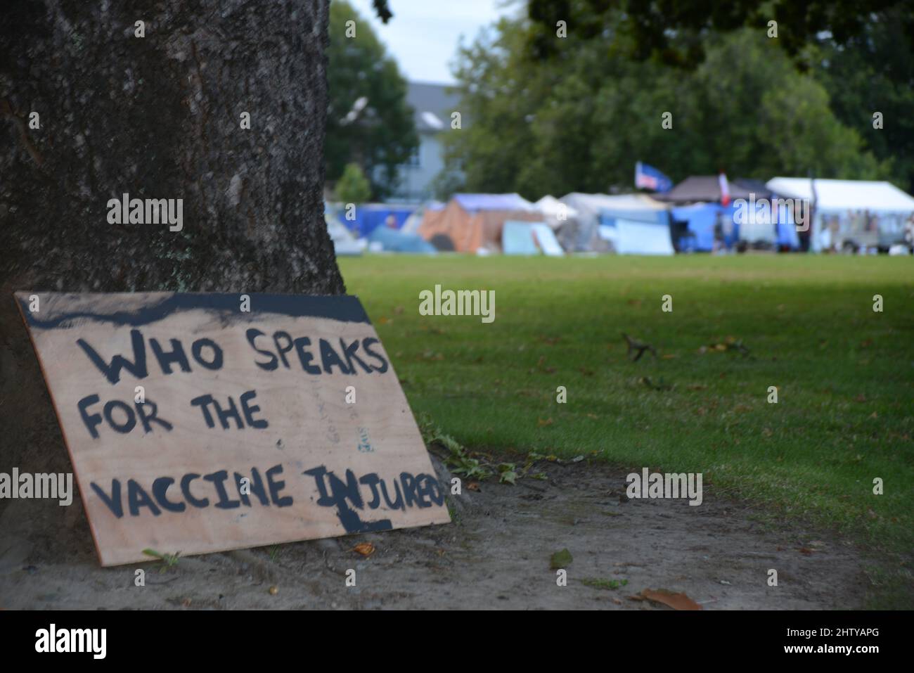CRISTCHURCH, NEW ZEALAND, FEBRUARY 22, 2022: Signage made by protesters in the Occupy Christchurch movement at Cranmer Square to voice opposition to vaccine mandates. Stock Photo