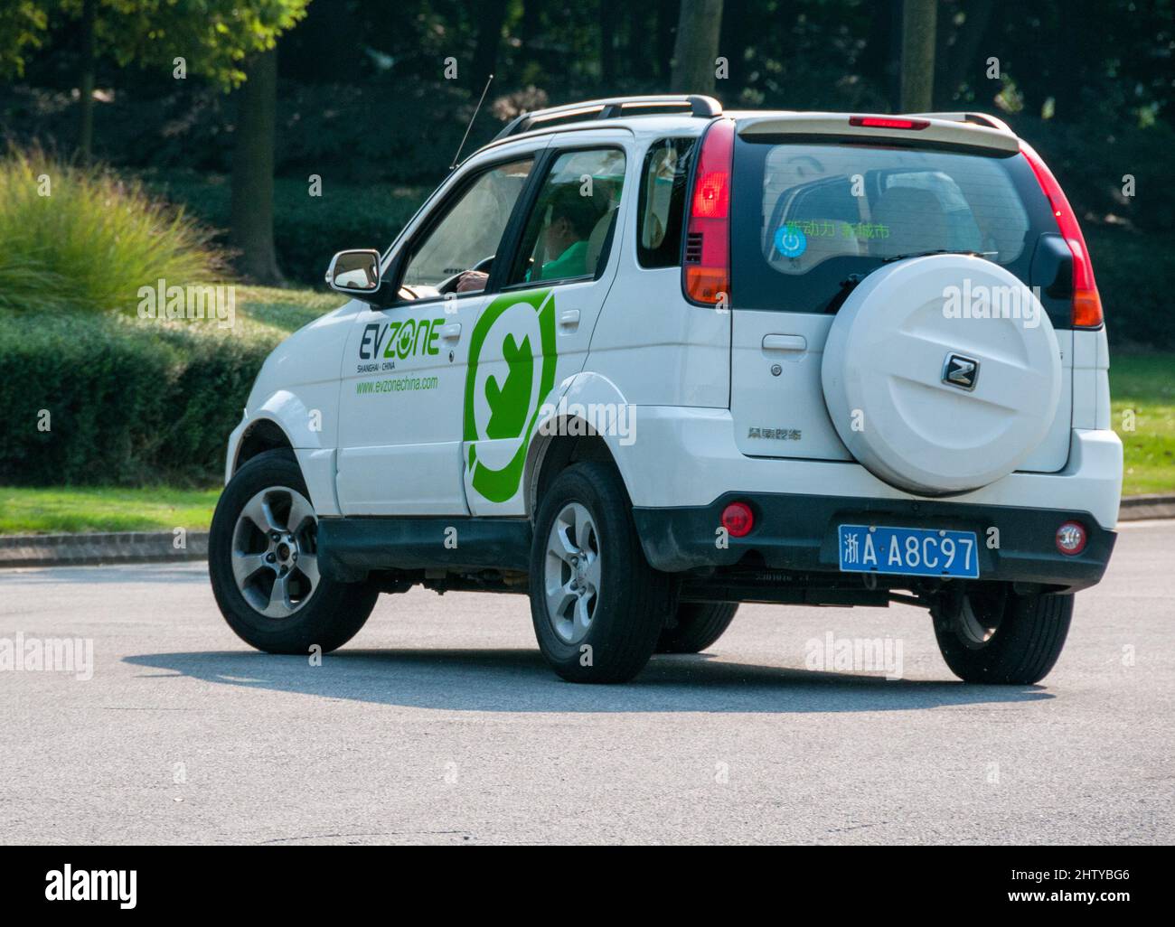 Daihatsu Terios based Zotye 5008 EV, an early Chinese EV, being driven at the EV Zone in Anting, Shanghai, China. Stock Photo