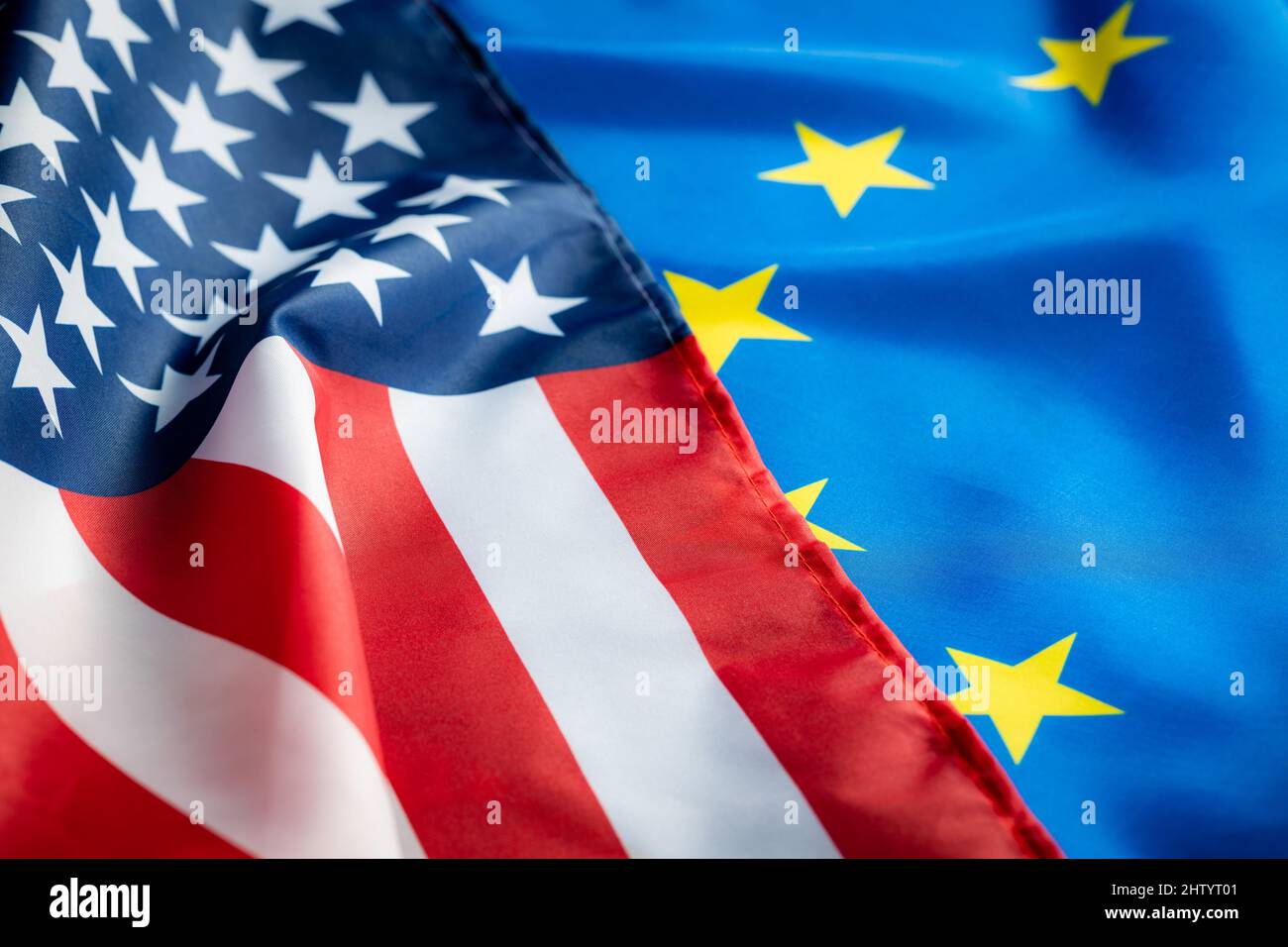 Eu europe union flag and usa united states of america flag. Two waving flags Stock Photo