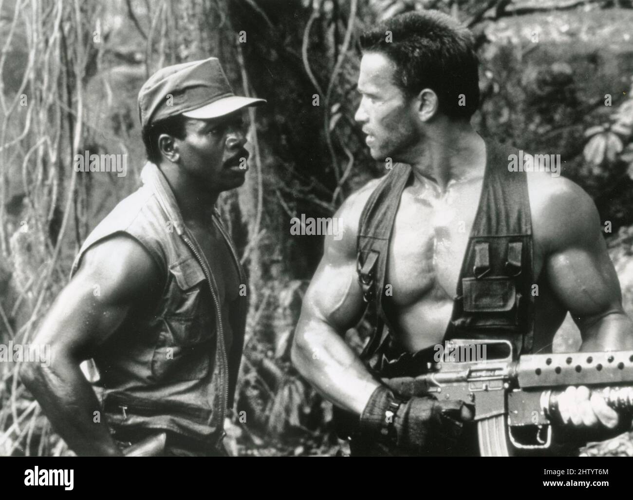American actor Arnold Schwarzenegger and Carl Weathers in the movie Predator, USA 1987 Stock Photo