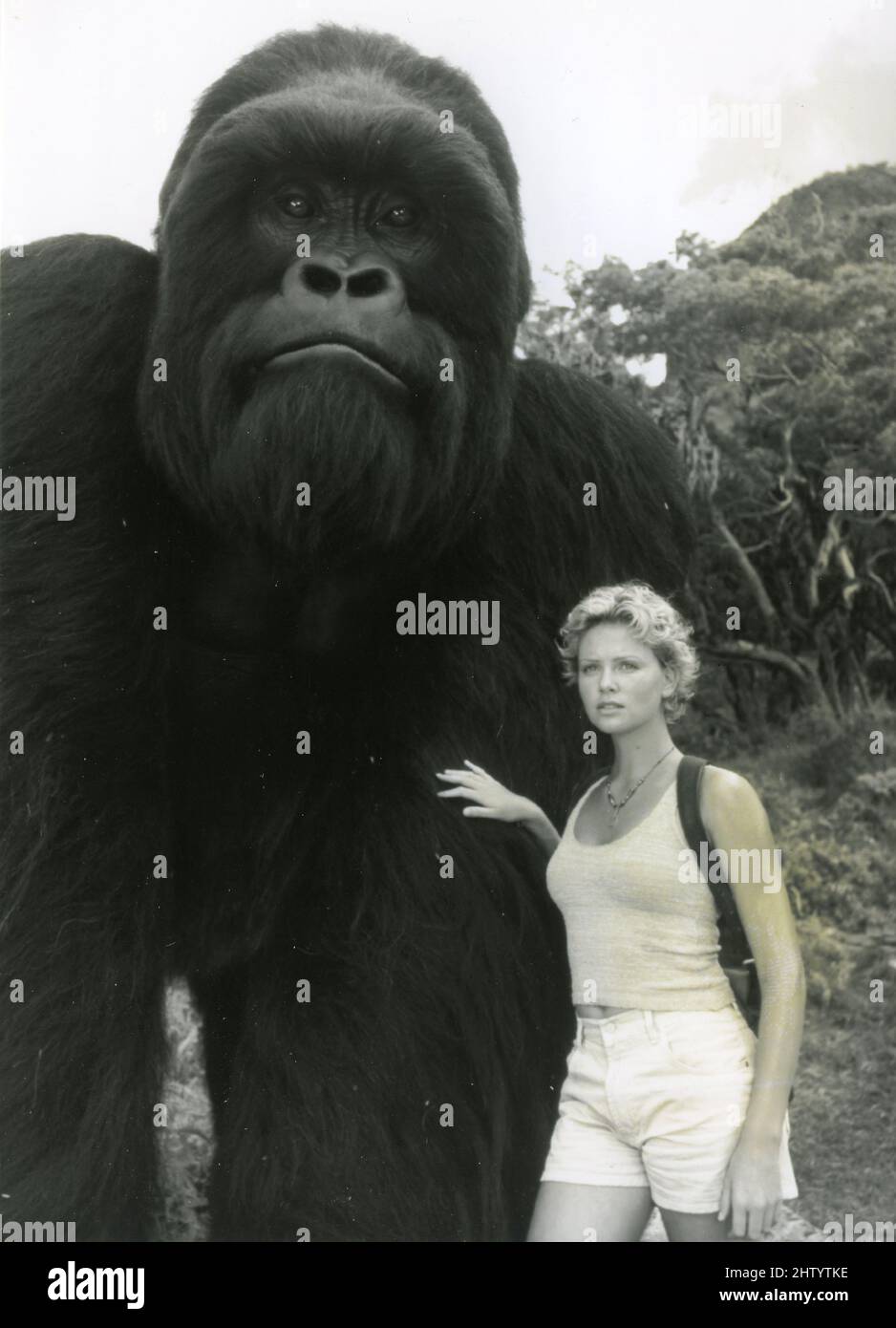 Actress Charlize Theron and the Gorilla in the movie Mighty Joe Young, USA 1998 Stock Photo