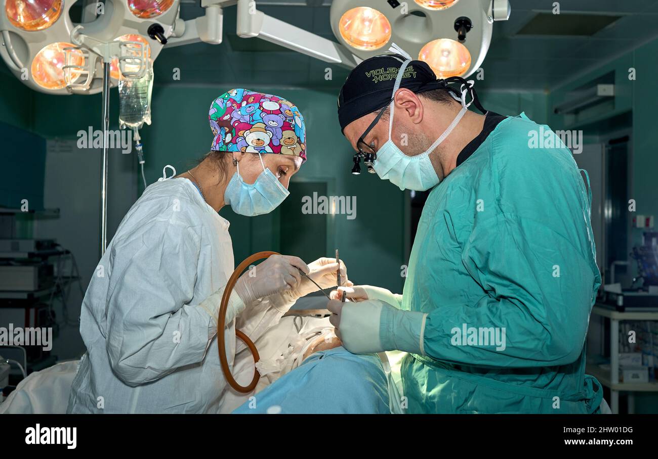 Operating Room Assistant I In the hospital operating room. An international team of professional ...