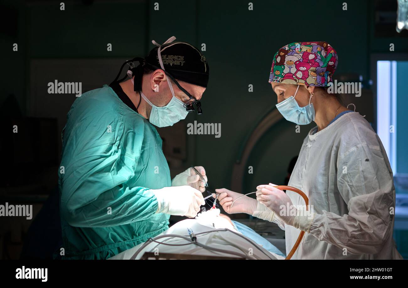 Operating Room Assistant I In the hospital operating room. An international team of professional ...