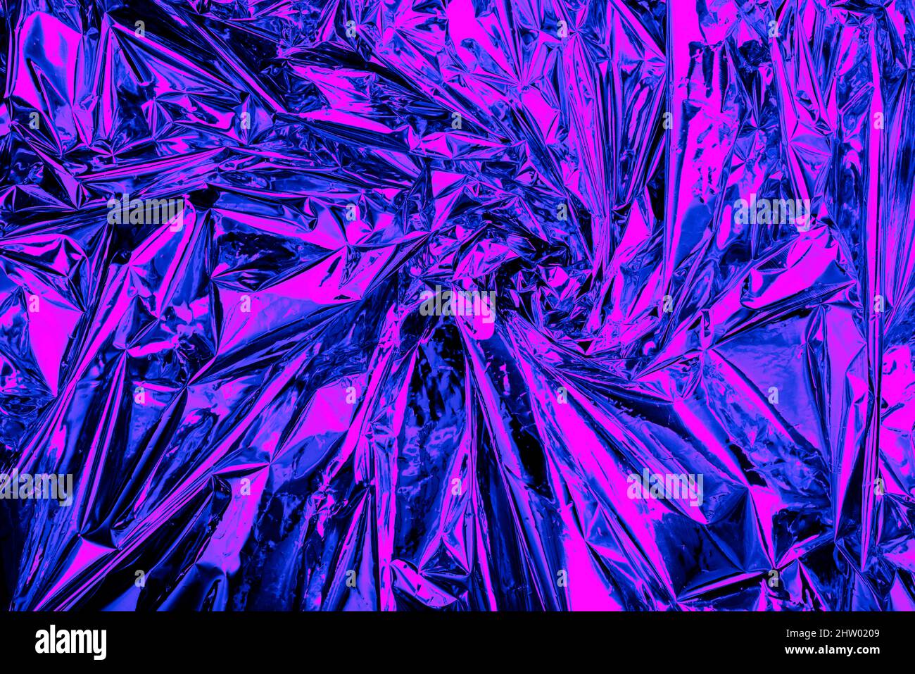 Neon background foil with purple and blue light. Psychedelic abstract gradient texture. Crazy wallpaper. Stock Photo