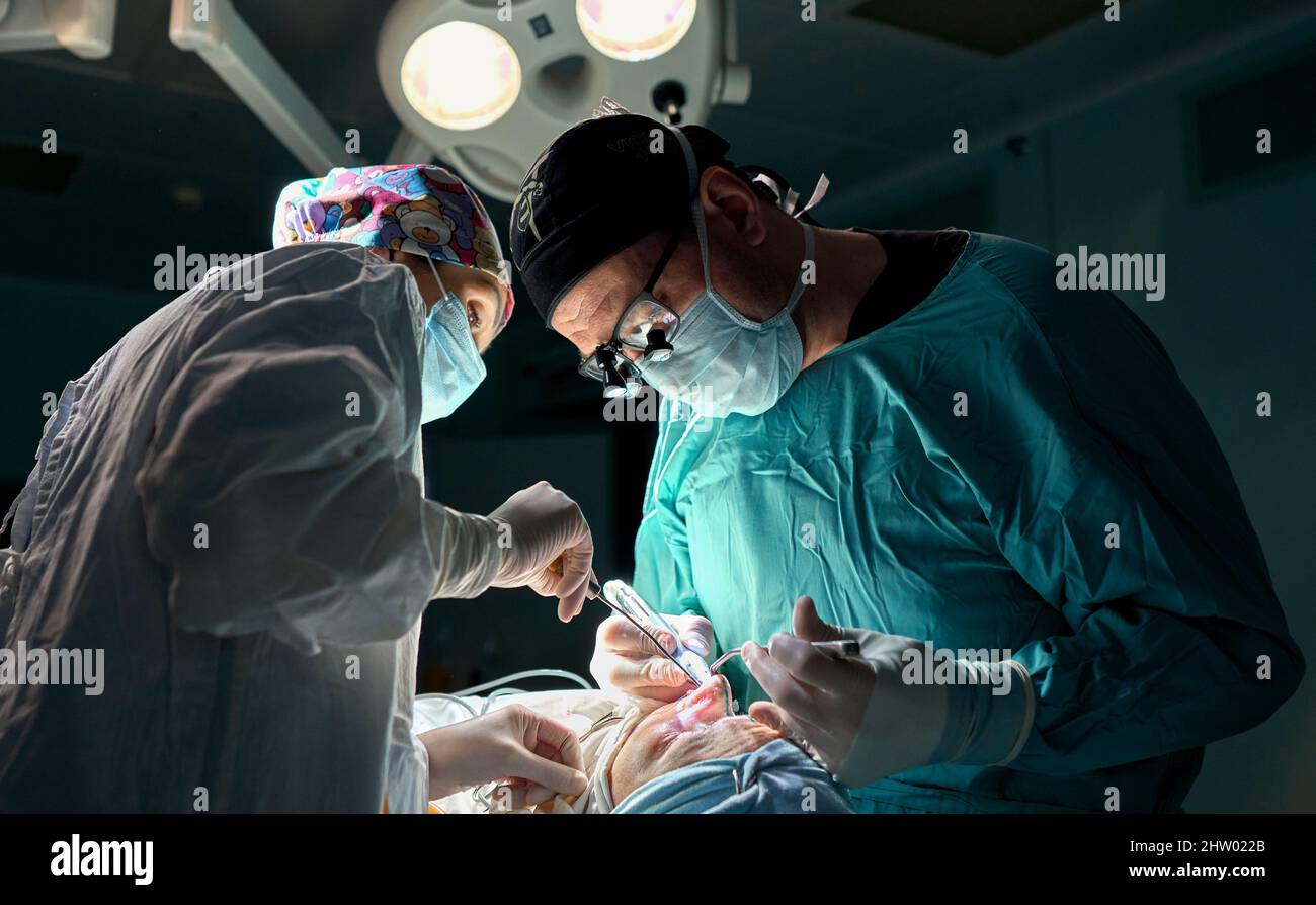 In the hospital operating room. An international team of professional ...