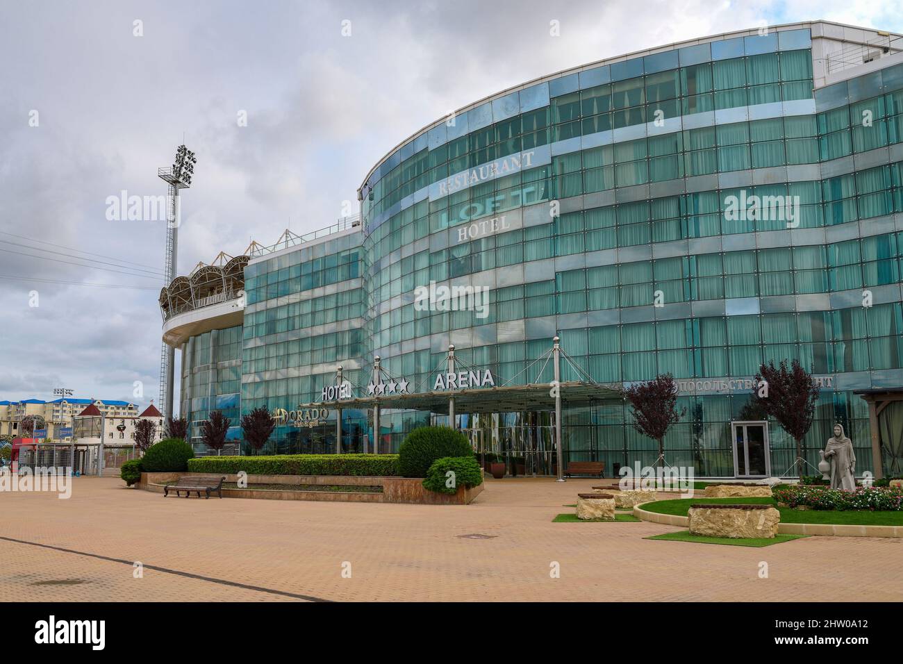 KASPIYSK, RUSSIA - SEPTEMBER 23, 2021: Facade of Anji Arena sports complex on a cloudy September day. The Republic of Dagestan Stock Photo