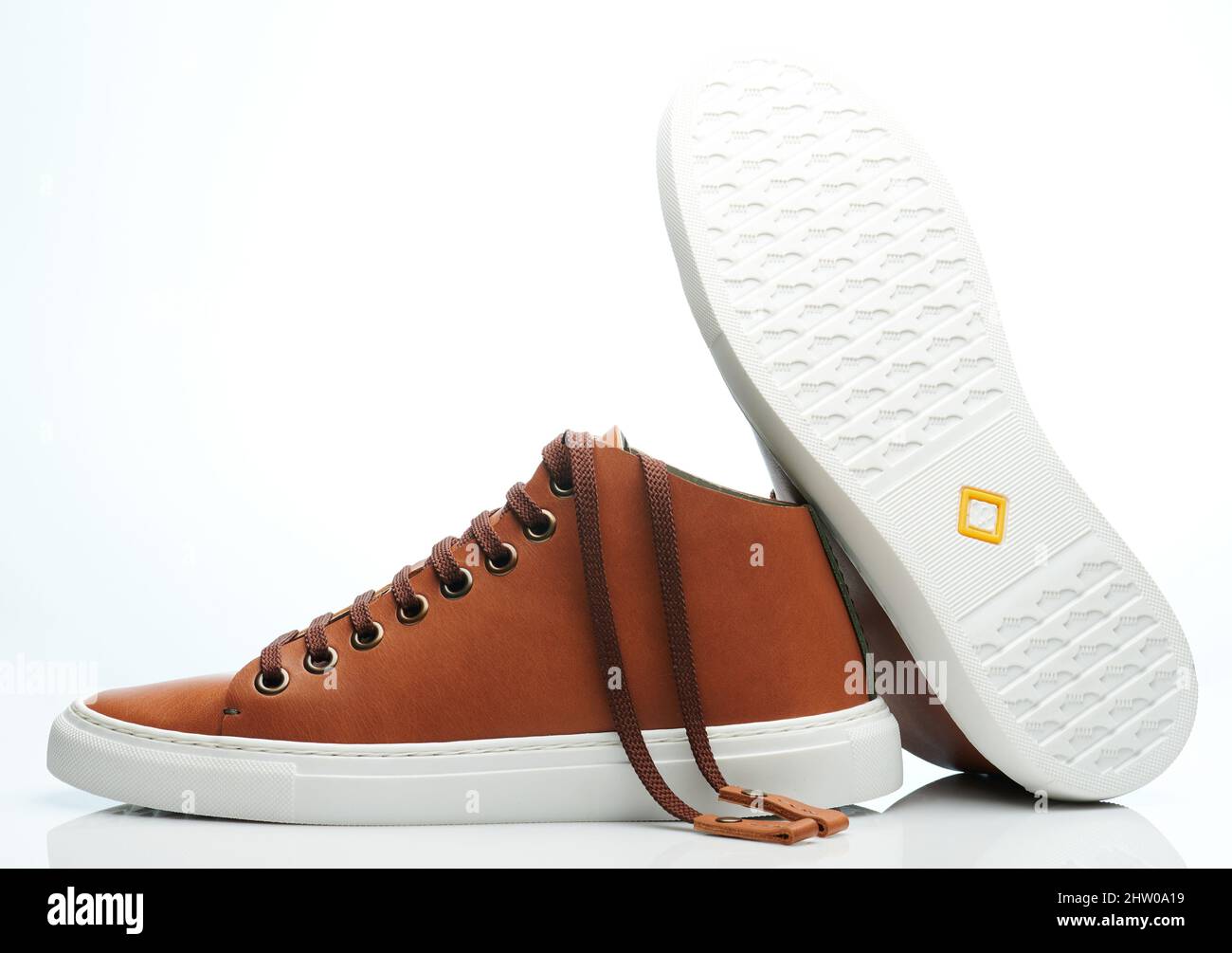 Diffrent view on brown leather sneaker shoes isolated Stock Photo