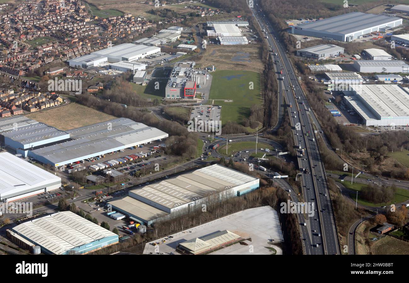 aerial view of industry alongside the M62 motorway at Junction 31, Normanton, West Yorkshire Stock Photo