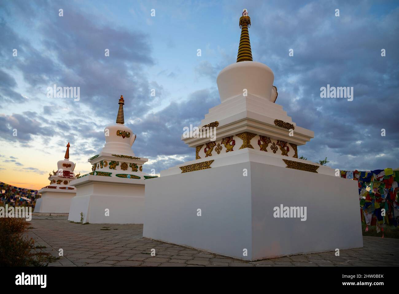 ELISTA, RUSSIA - SEPTEMBER 20, 2021: View of stupas in the Buddhist temple of Shakyusn-syume, September sunset. Elista. Republic of Kalmykia Stock Photo