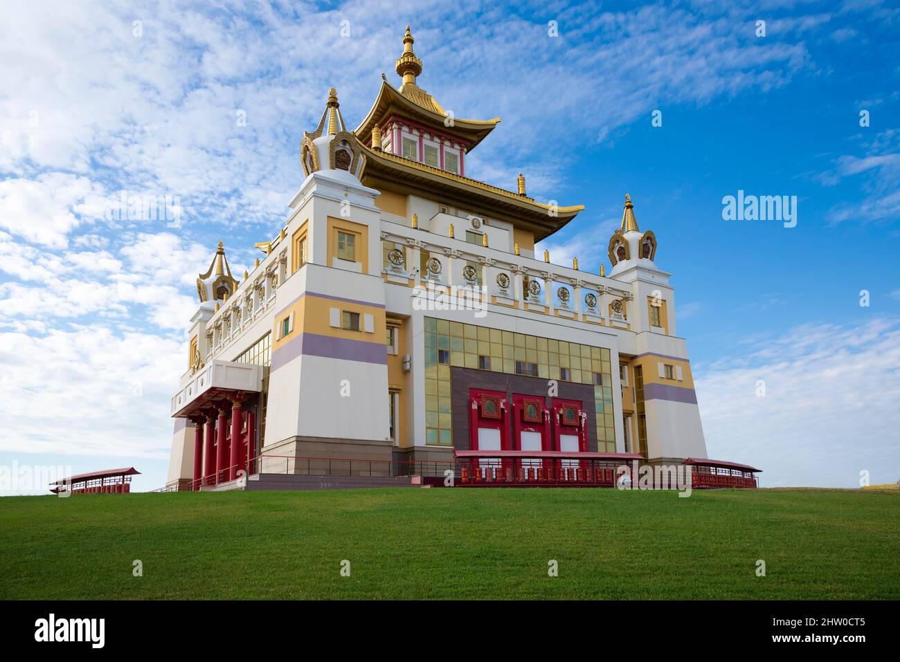 Buddhist temple 'Golden Abode of Buddha Shakyamuni' against a cloudy sky. Elista, Kalmykia, Russia Stock Photo
