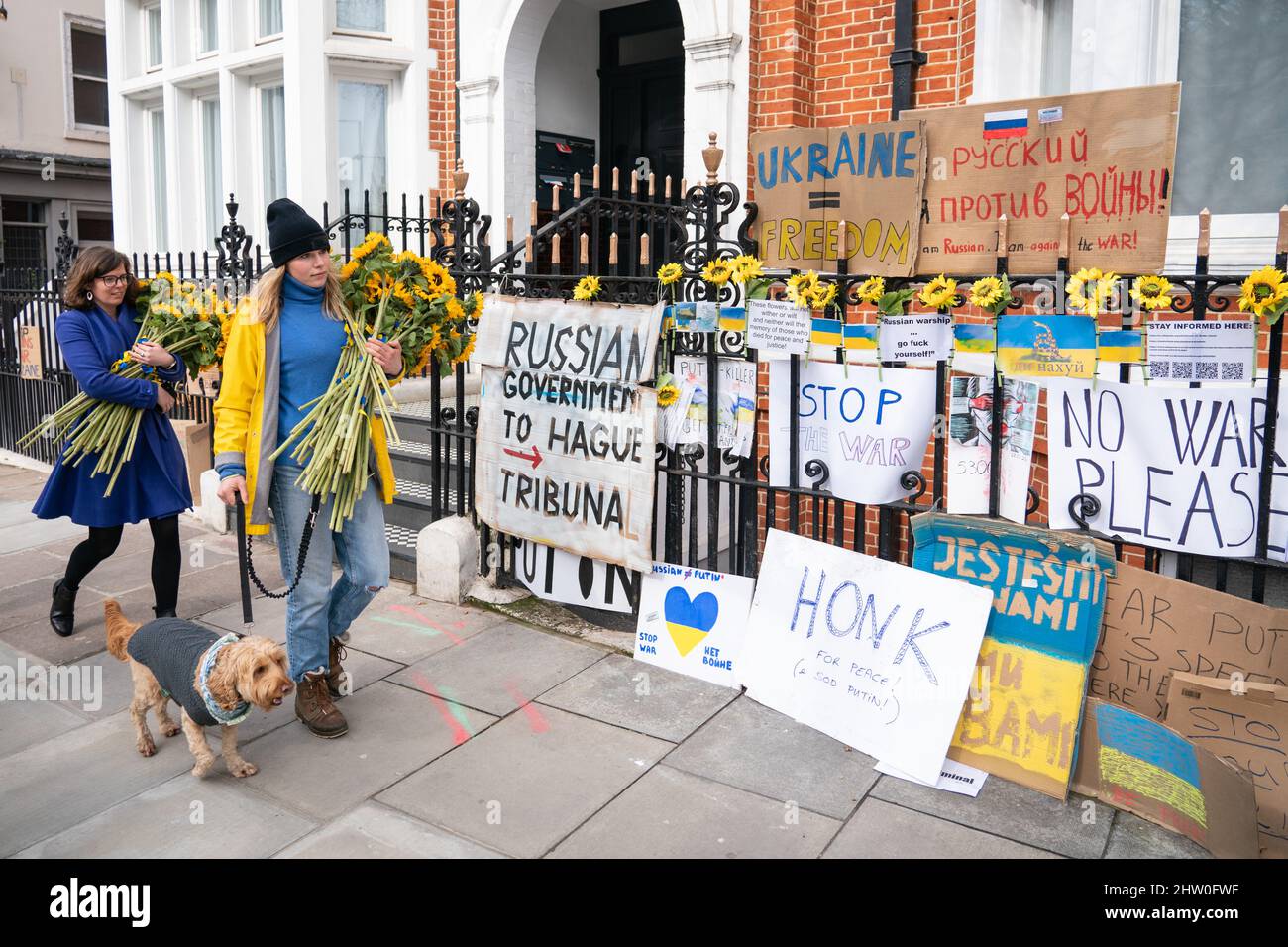 Editors please note language on placards. A group of people