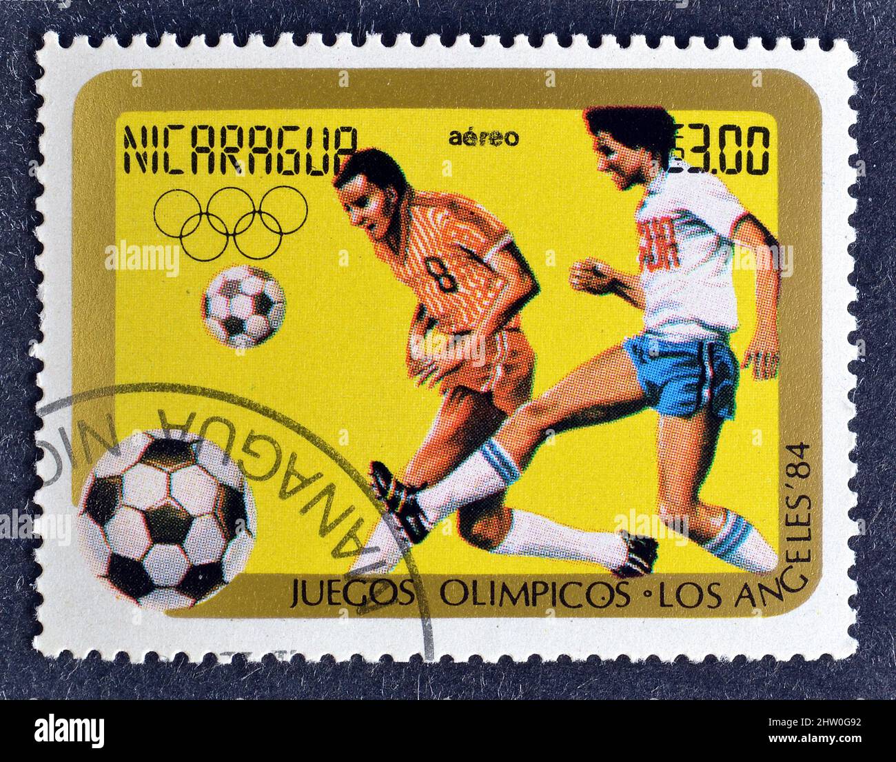 Cancelled postage stamp printed by Nicaragua, that shows Football, Summer Olympic Games 1984 - Los Angeles, circa 1984. Stock Photo