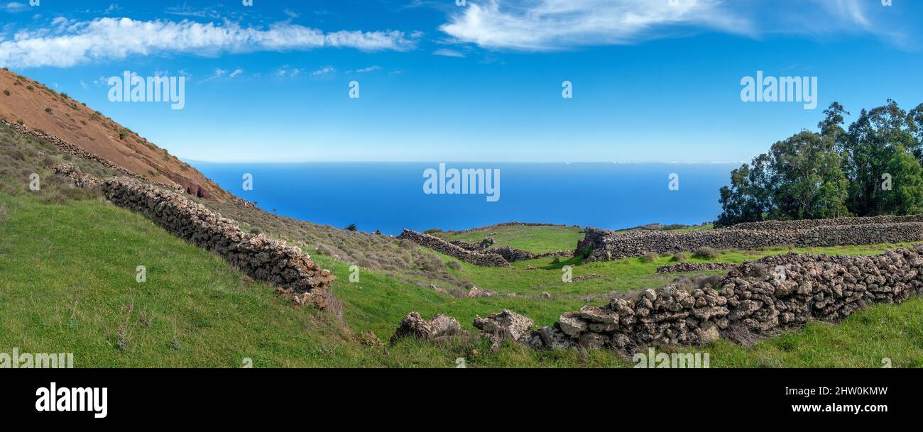 Landscape in El Hierro - meadow with stone walls and sea view Stock Photo