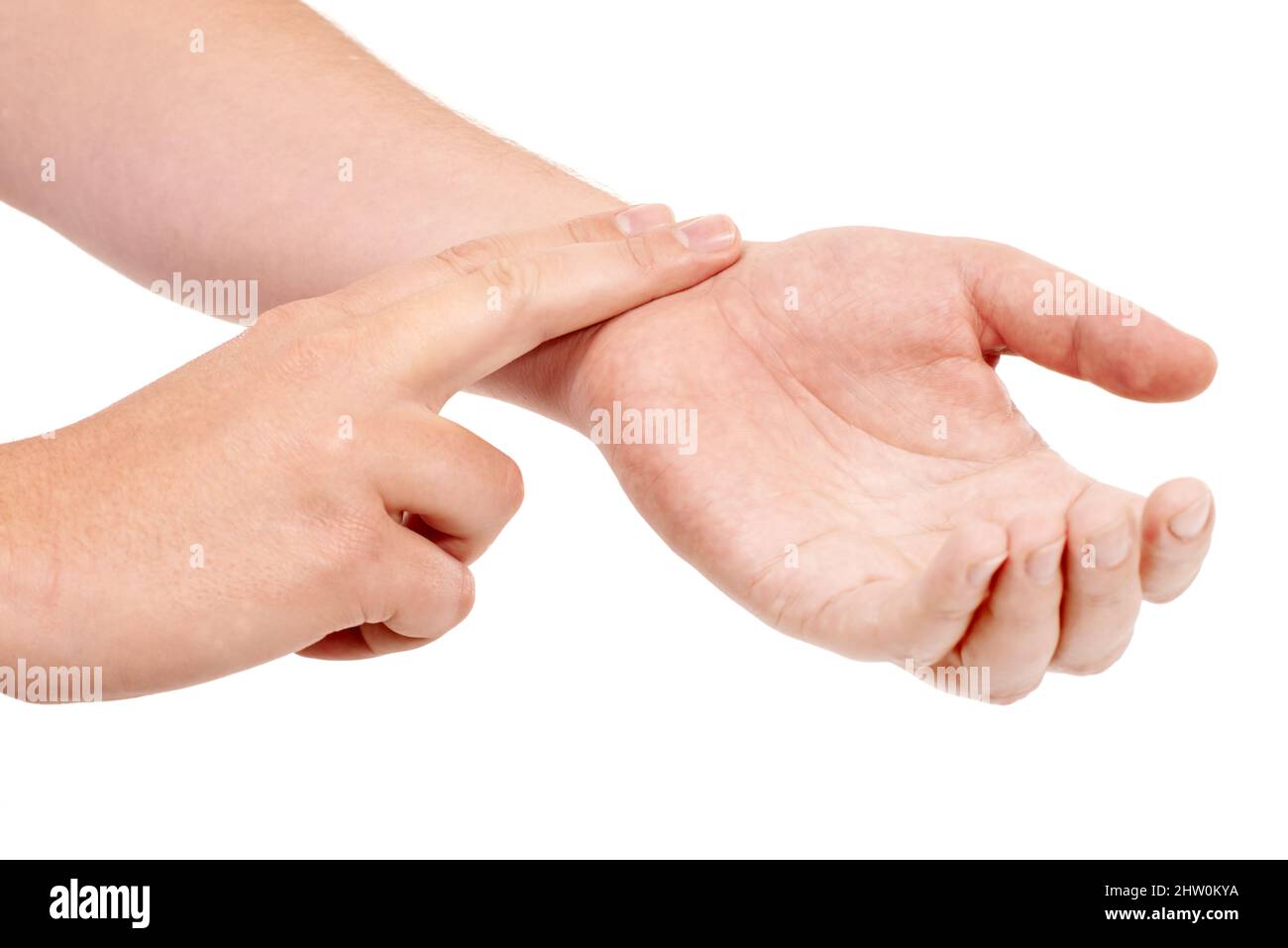 The correct way to check a pulse. Male hands taking a pulse rate