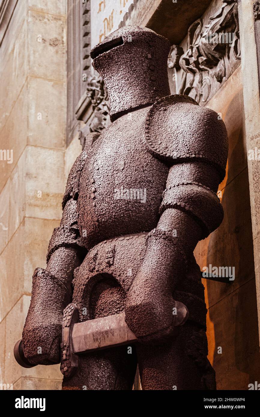 Defender guardian concept, a stone knight warrior statue holding a