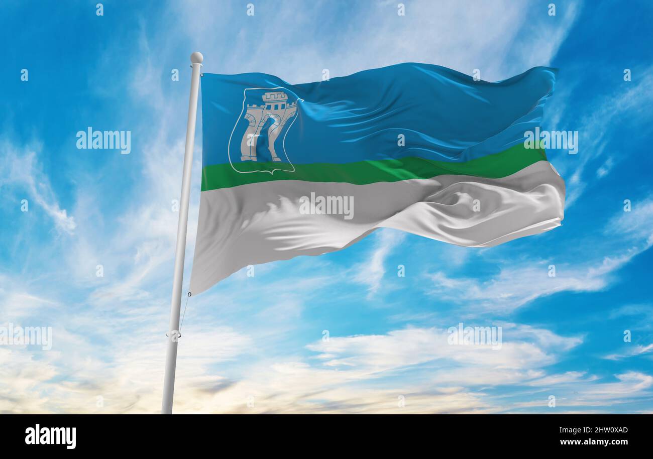 flag of Rivne , Ukraine at cloudy sky background on sunset, panoramic view. Ukrainian travel and patriot concept. copy space for wide banner. 3d illus Stock Photo