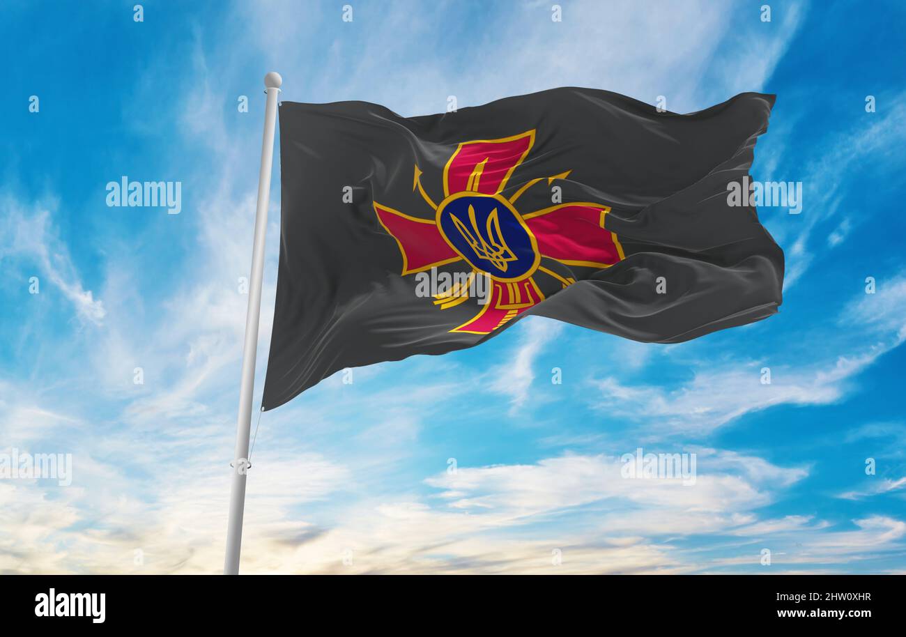 flag of Special Operations Forces , Ukraine at cloudy sky background on sunset, panoramic view. Ukrainian travel and patriot concept. copy space for w Stock Photo