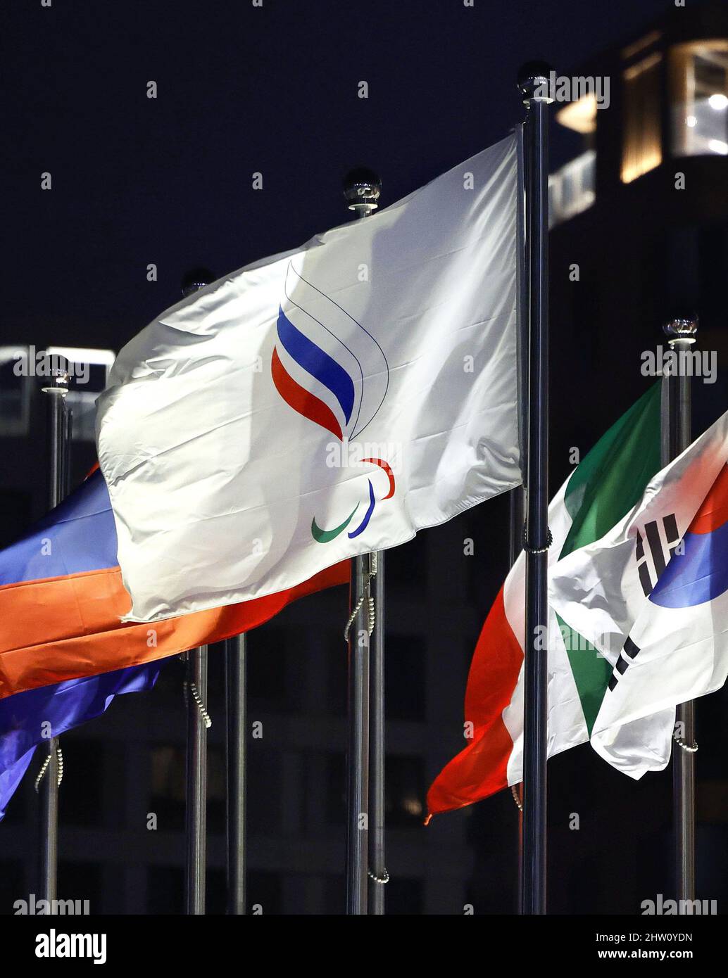 Photo taken on March 3, 2022, shows the flag of the Russian Paralympic Committee (C) at the athletes' village for the Beijing Winter Paralympics in Beijing on the eve of its opening ceremony. The International Paralympic Committee decided the same day to ban athletes from Russia and Belarus from the Beijing Games, reversing its governing board's decision from the previous day that would have allowed them to compete as neutrals. (Kyodo)==Kyodo  Photo via Newscom Stock Photo