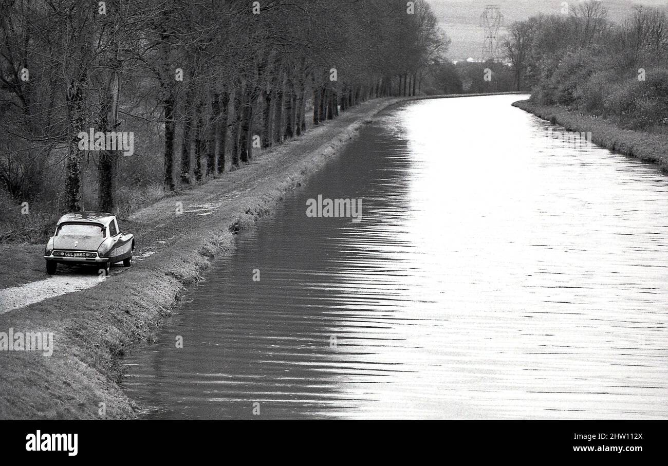 1964 Citroen DS19 driving by the Burgundy canal France Stock Photo