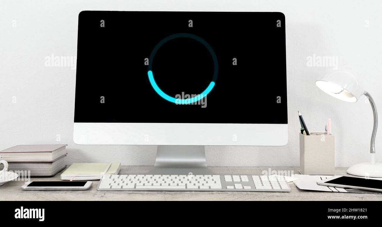 Image of loading circle on computer in office Stock Photo - Alamy