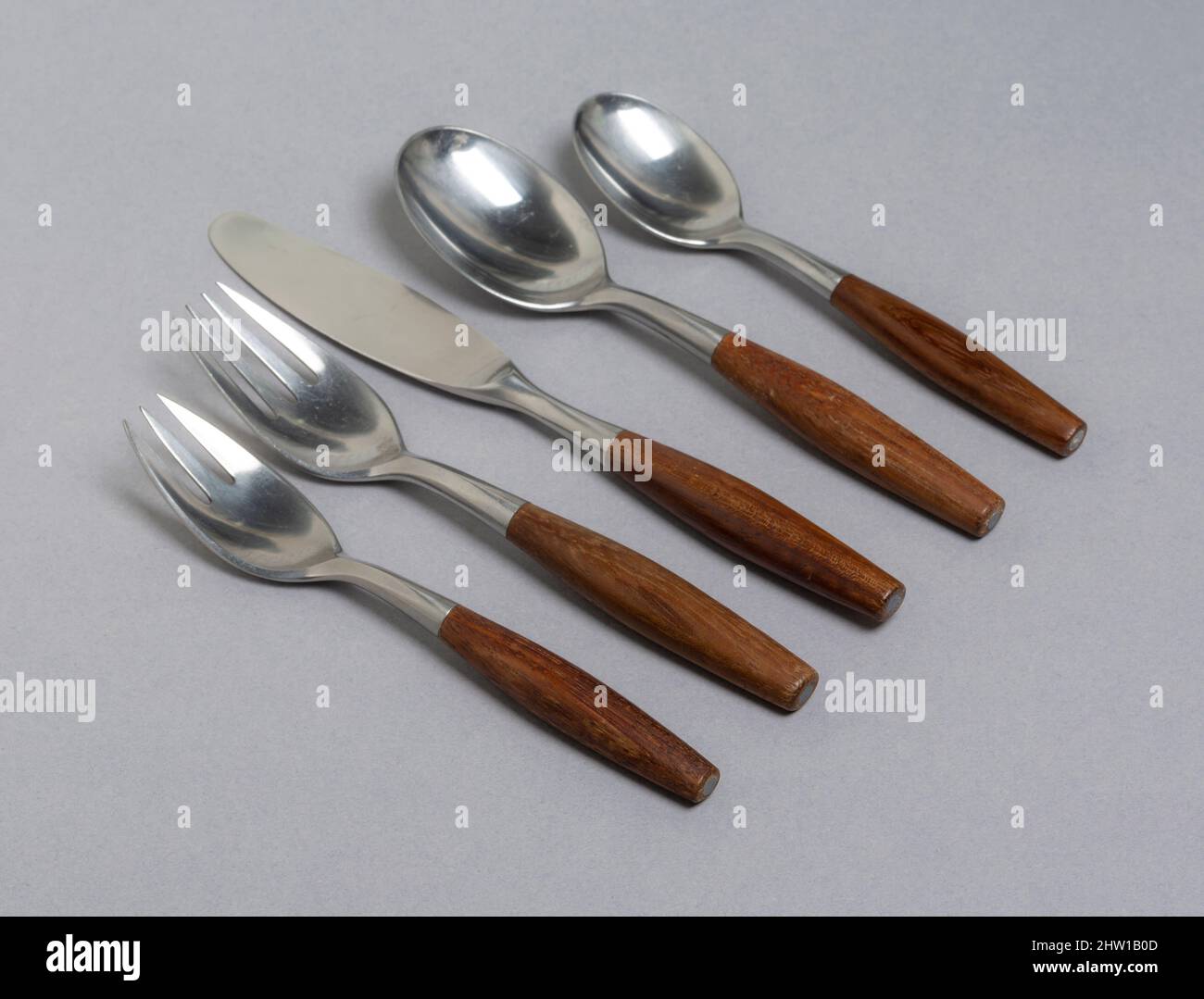 Dansk Fjord place setting with teak handles, 1954 design by Jens Quistgaard, made in Germany Stock Photo