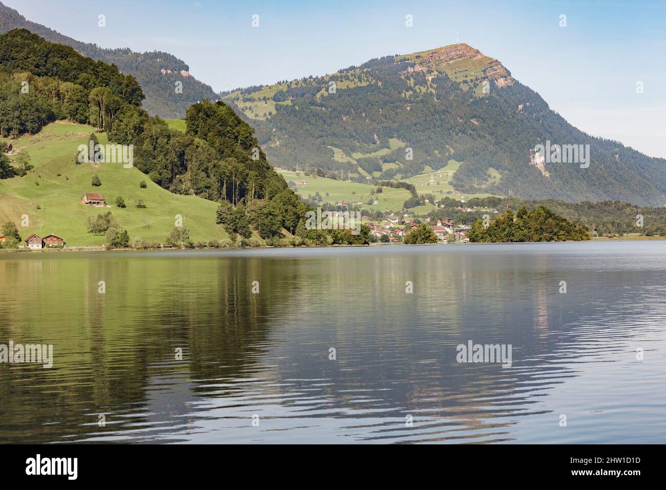 Switzerland, canton of Schwyz, Lauerz, mountain pasture, Lake Lauerz and Lauerz town, topped by Mount Rigi Stock Photo