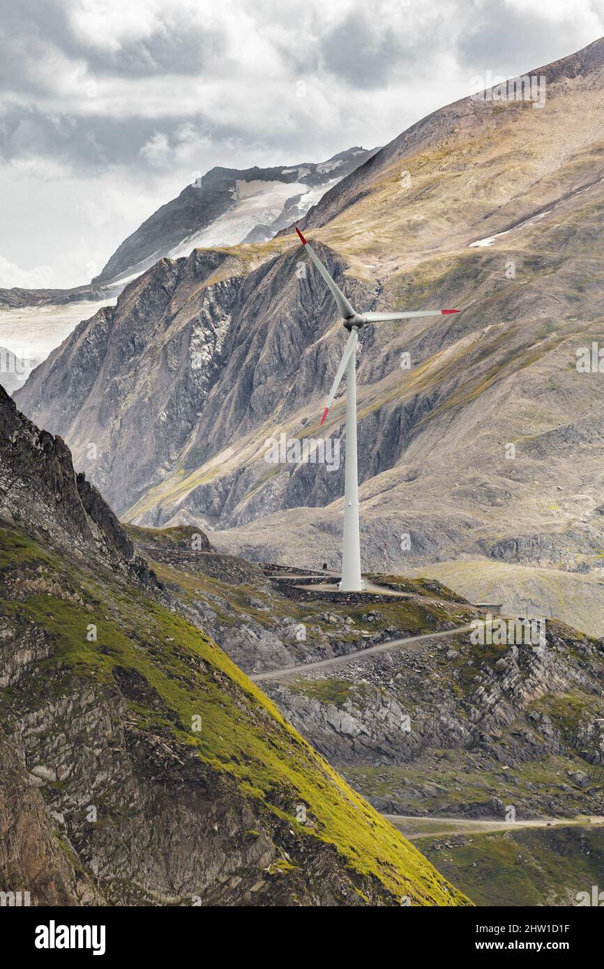 Switzerland, canton of Ticino, Ulrichen, Nufenen pass, Gries dam, wind turbine in its mountain environment, site of the highest wind farm in Europe, 2500 meters above sea level Stock Photo