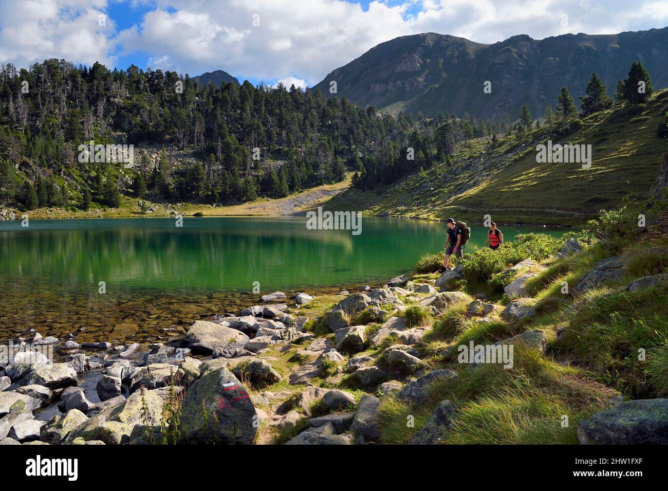 France, Hautes Pyrenees, Saint Lary Soulan and Vielle-Aure, hike on a variant of the GR10 between the Portet pass and the Bastan lakes on the edge of the Neouvielle nature reserve, lower Bastan lake Stock Photo