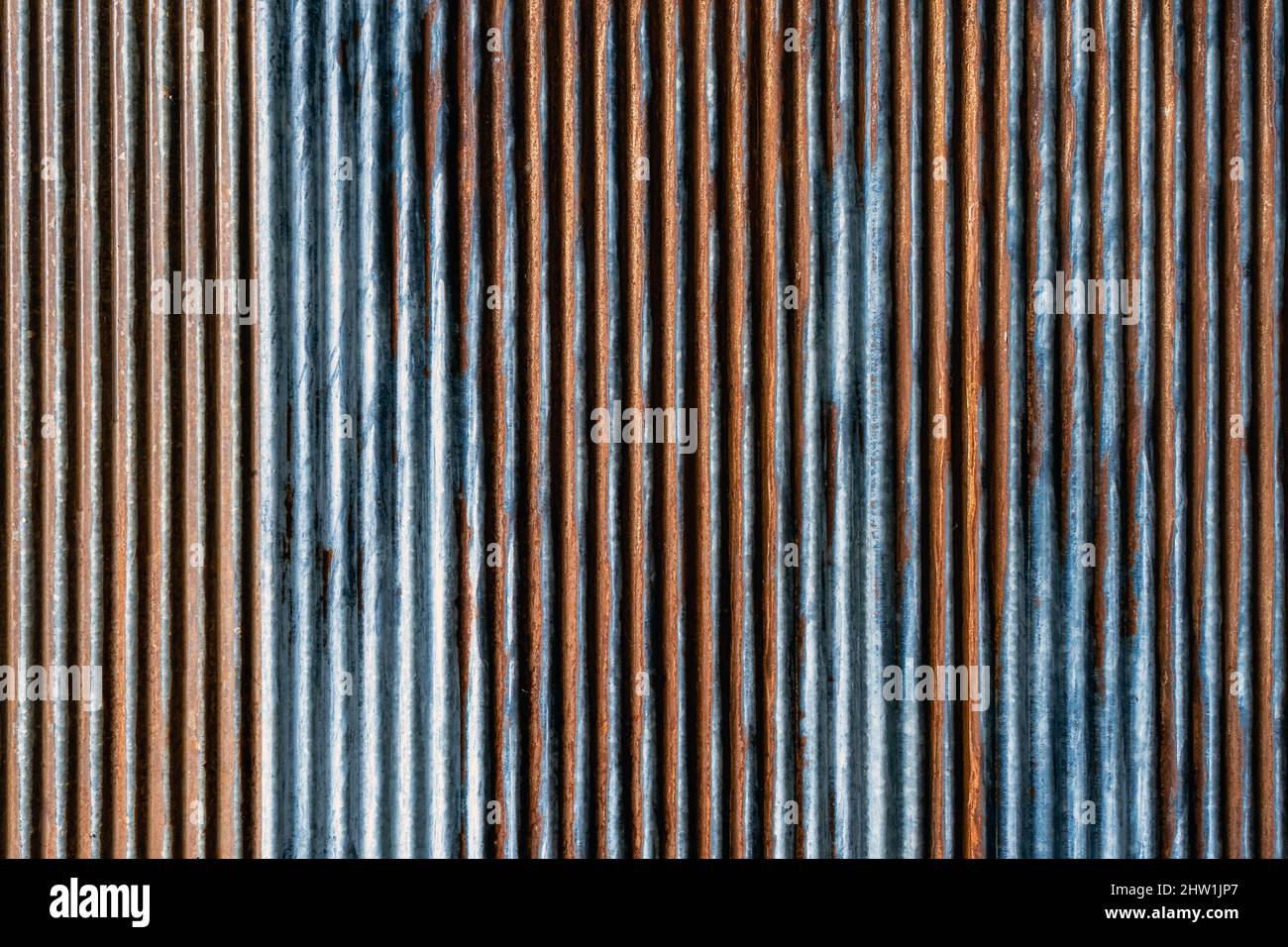 Artistic of old and rusty zinc sheet wall. Vintage style metal sheet