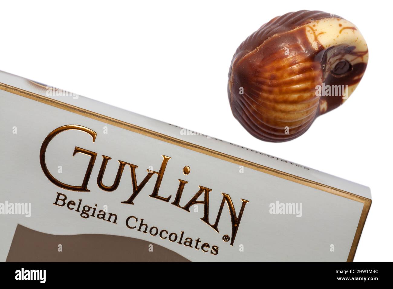 Guylian Belgian chocolates seashells chocolate seashell with box set on white background - finest Belgian chocolates with hazelnut praline filling Stock Photo