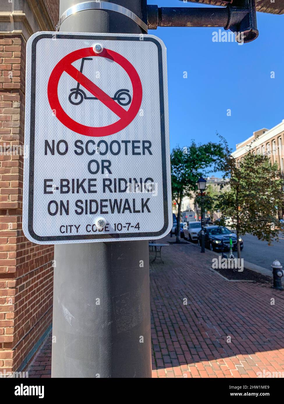 Alexandria, Virginia. No Scooter or e-Bike Riding on Sidewalk. Stock Photo