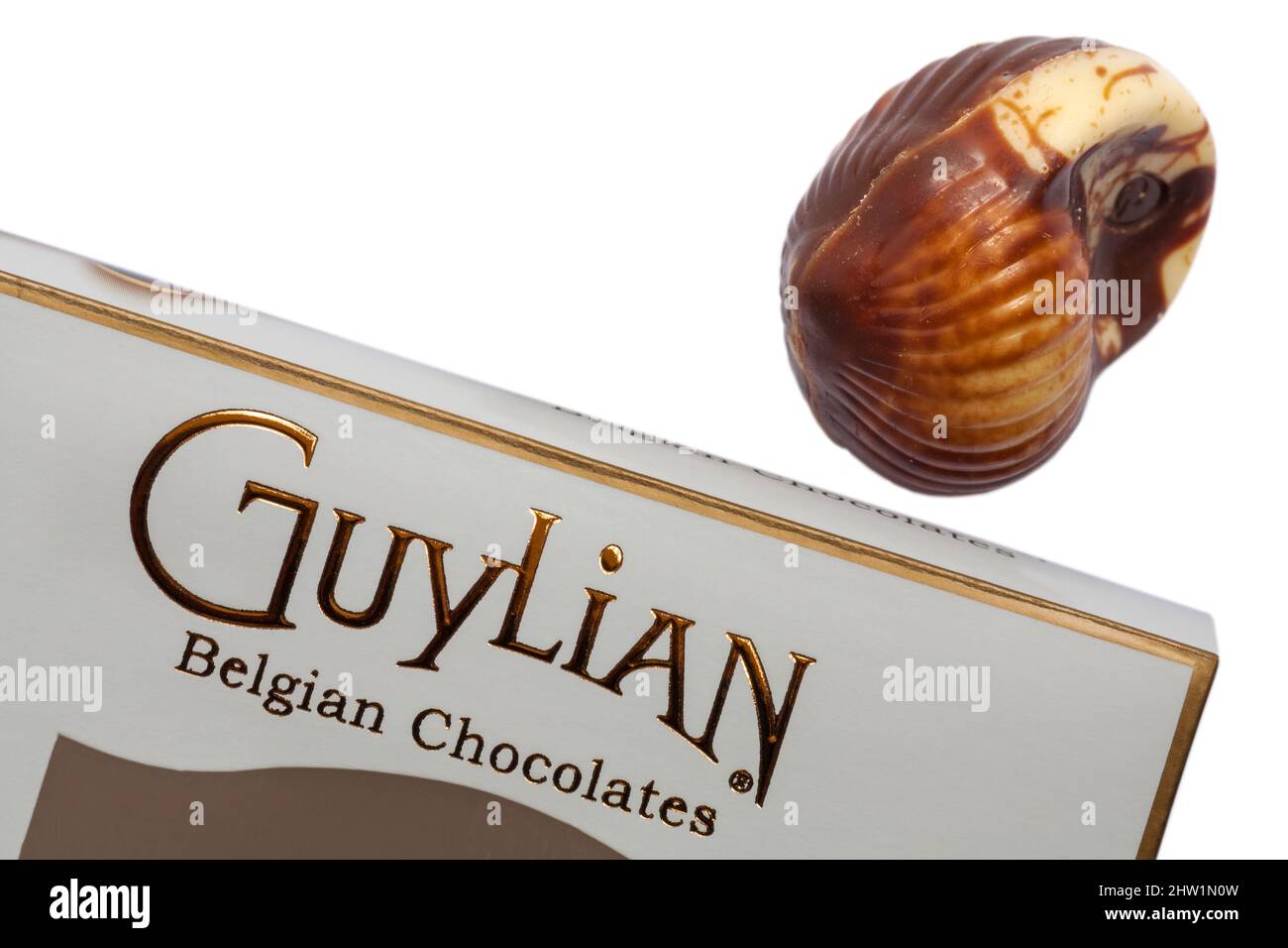 Guylian Belgian chocolates seashells chocolate seashell with box set on white background - finest Belgian chocolates with hazelnut praline filling Stock Photo