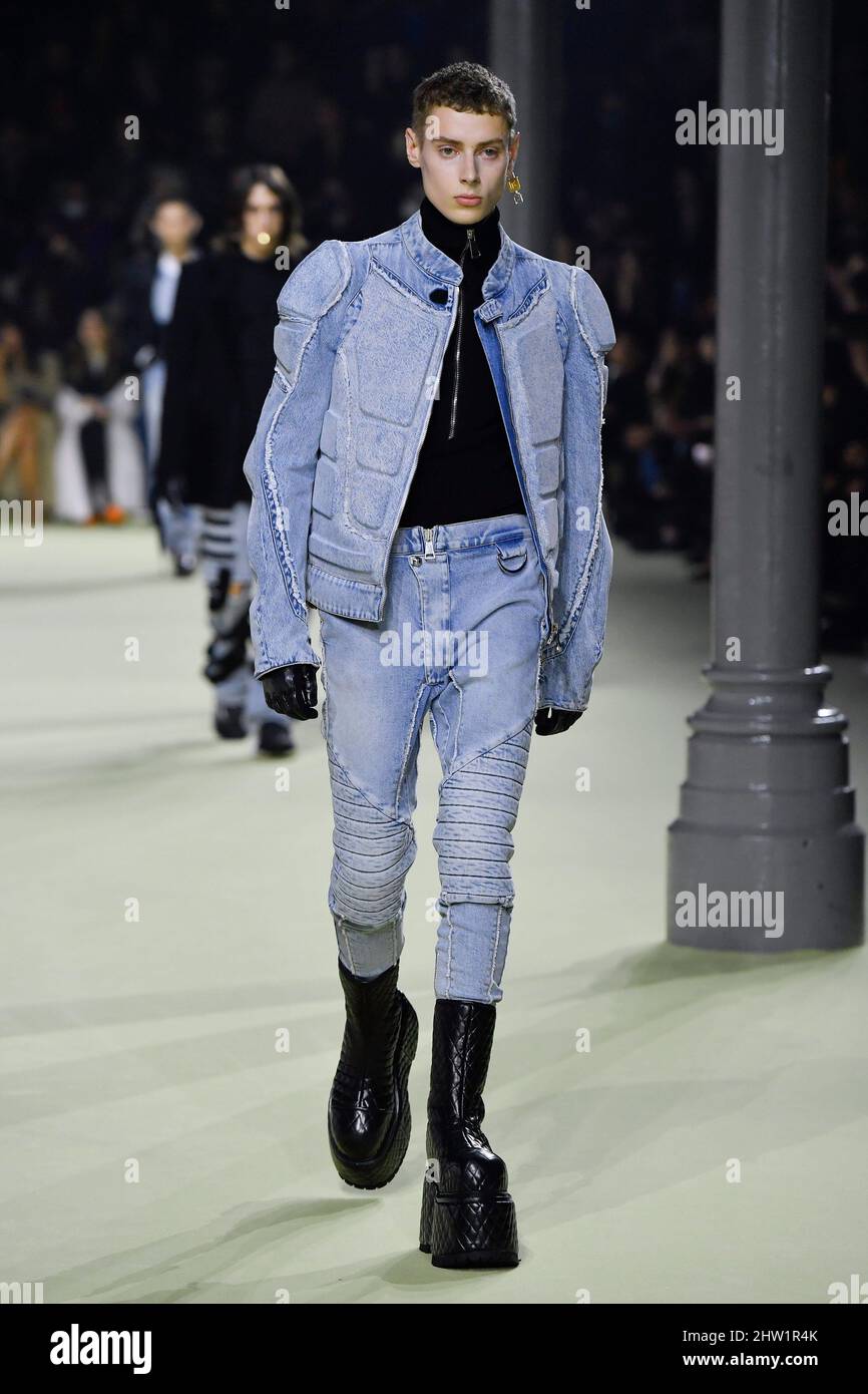 Model Callum Heslop walks on the runway at the Balmain fashion show ...