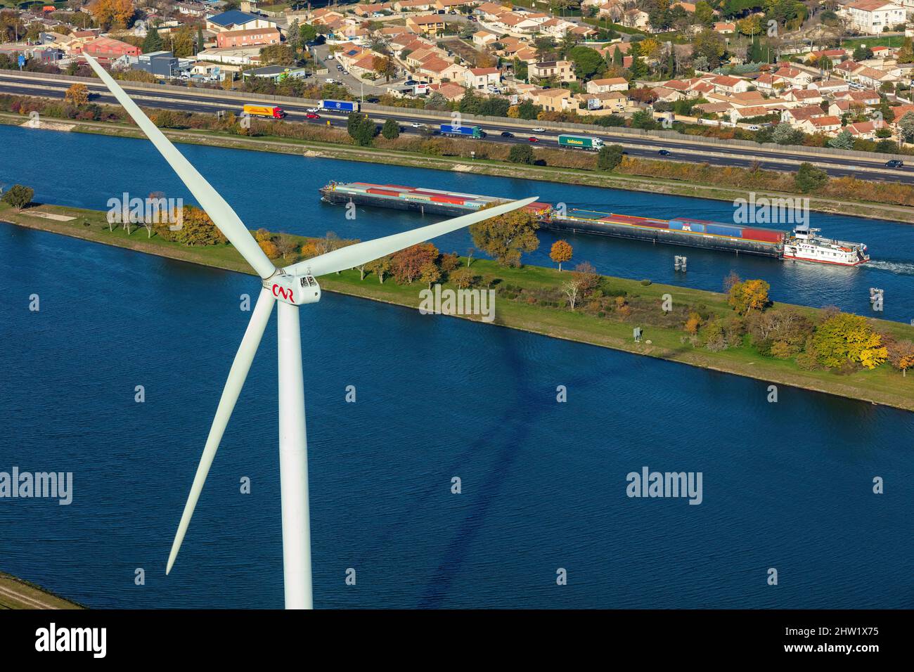 France, Vaucluse, Bollene, wind turbine, barge on Le Rhone, container transport, A7 Sun highway, wind farm (aerial view) Stock Photo