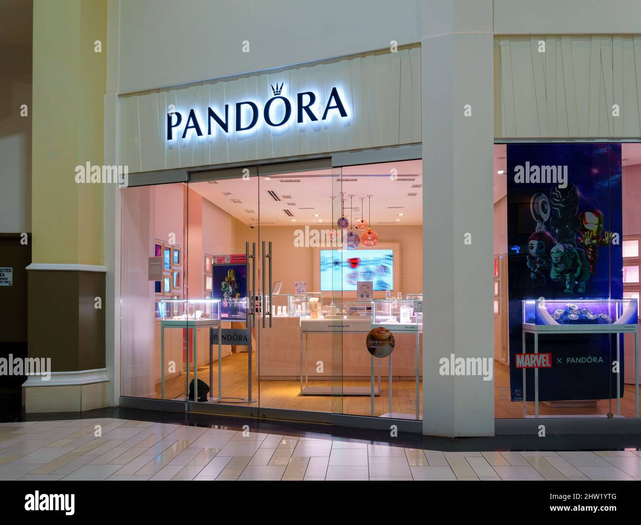 New Hartford, New York - Mar 1, 2022: Closeup View of PANDORA Storefront inside Sangertown Mall. Pandora is an International Jewelry Company that Oper Stock Photo