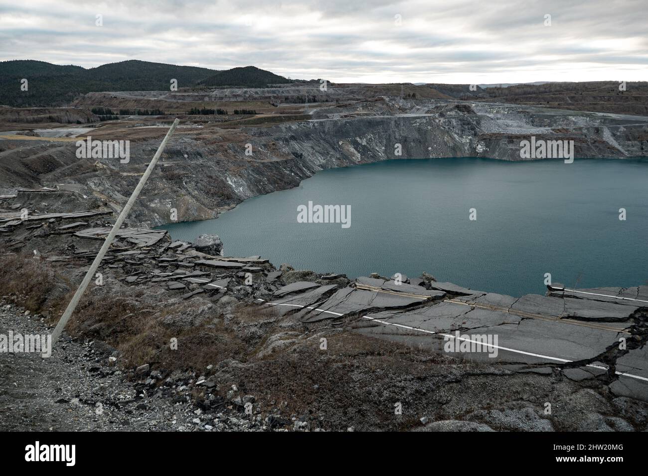 Broken road, abandoned openair mine in Black Lake, Quebec, Canada