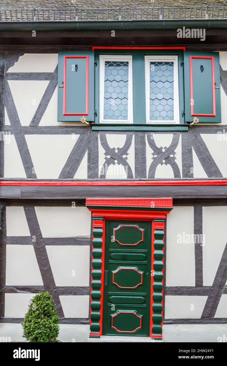 Historic half-timbered house with decorative wooden door, Eltville am Rhein, Rheingau, Hesse, Germany Stock Photo