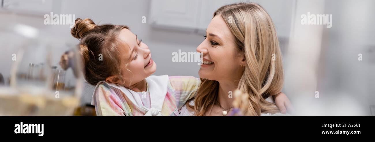 happy mother and child smiling at each other at home, banner,stock image Stock Photo